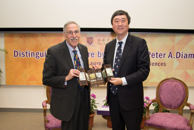 Prof. Joseph J.Y. Sung (right), Vice-Chancellor, presents a souvenir to Prof. Diamond